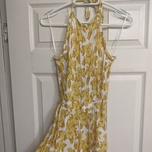 Yellow and white floral shorts romper